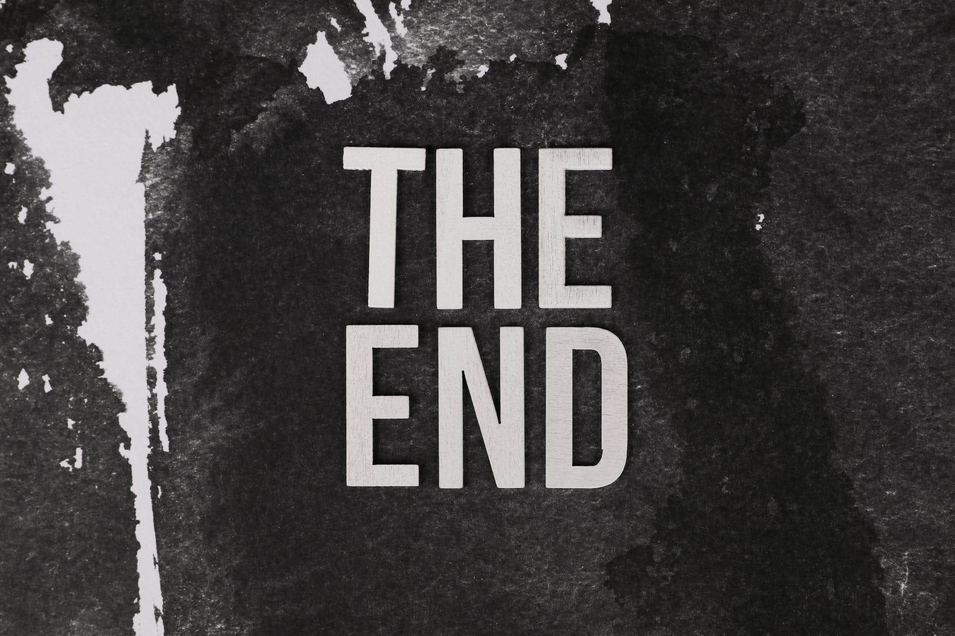 monochrome photo of the end text
