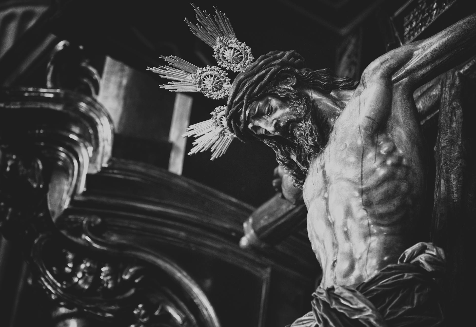 grayscale photo of a statue